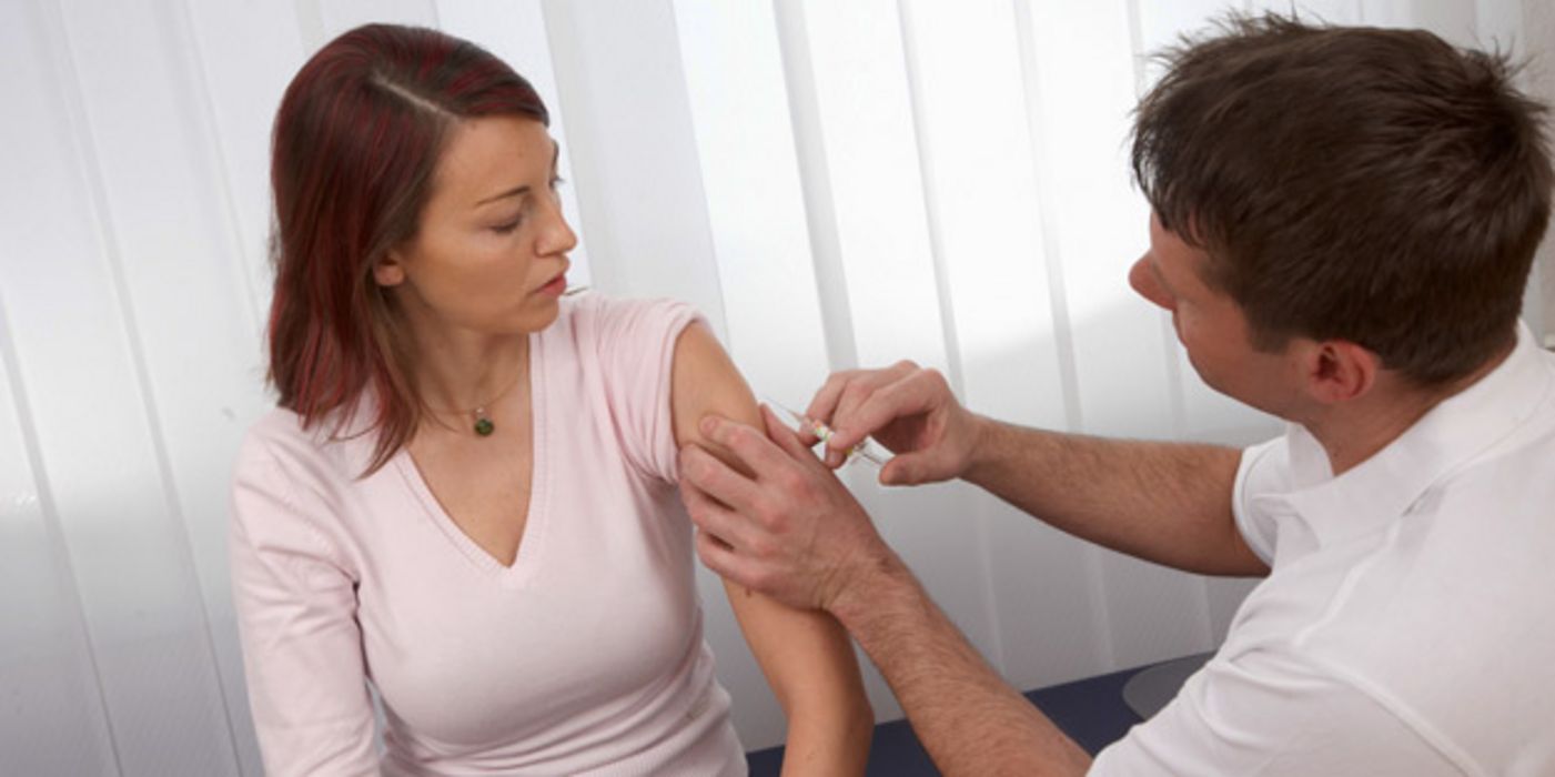 Fernreisende profitieren von einer Grippe-Impfung.