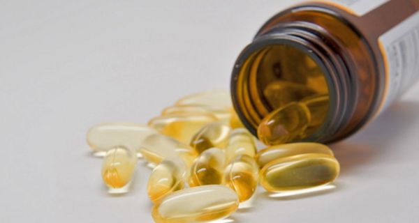 Vitamin D-Weichgelatinekapseln und Arzneifläschchen
