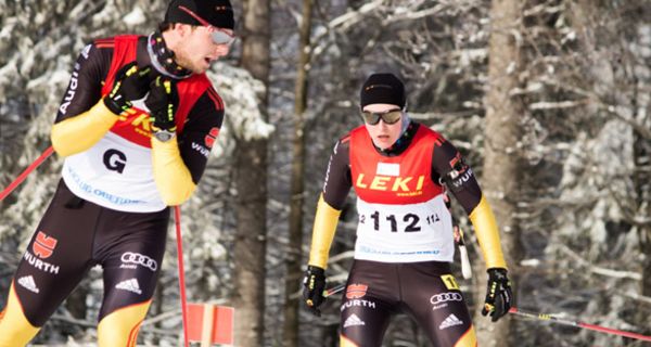 Die Biathletin Vivian Hösch und ihr Begleitläufer Norman Schlee beim Nordischen Skiweltcup in Oberried